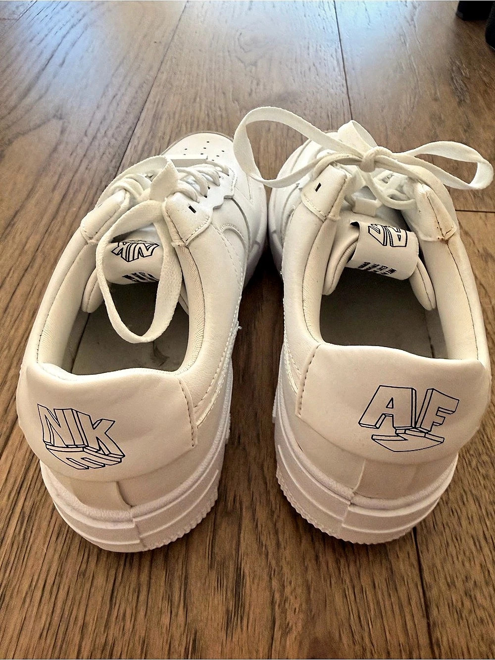 Nike Air Force 1 Pixel "Triple White" Pixel Sneakers in White 7.5 women
